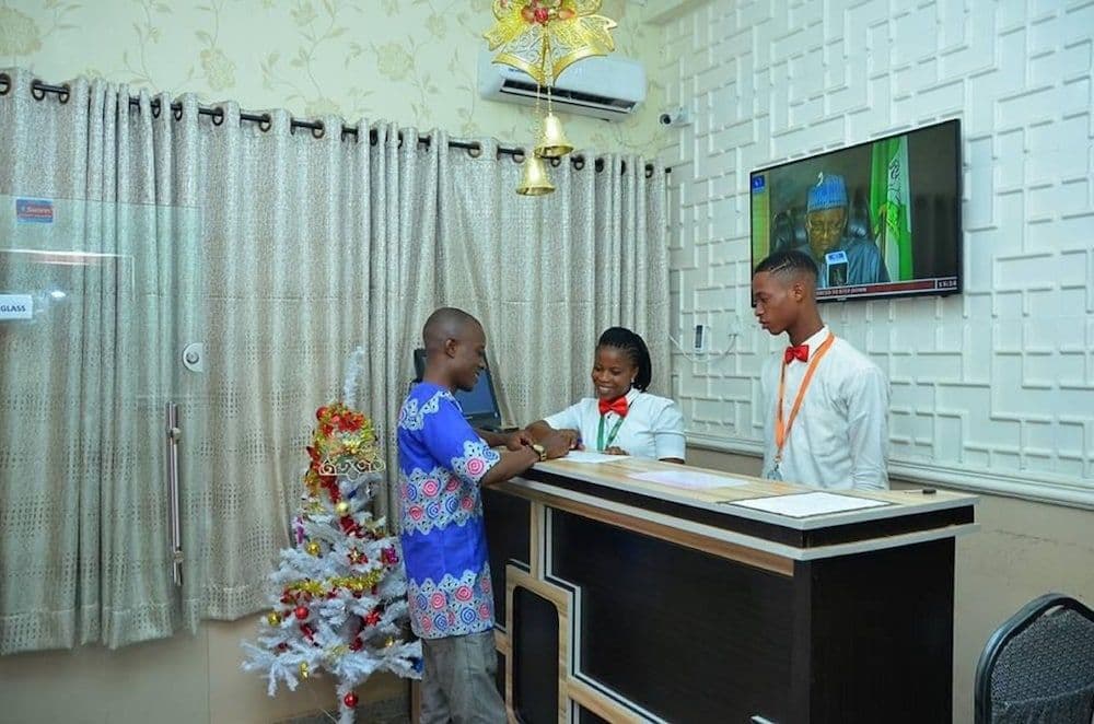 Friendly reception desk welcoming guests at Kosayo Hotel